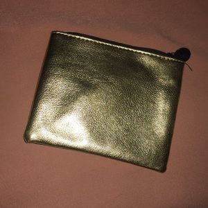 Gold cosmetic bag